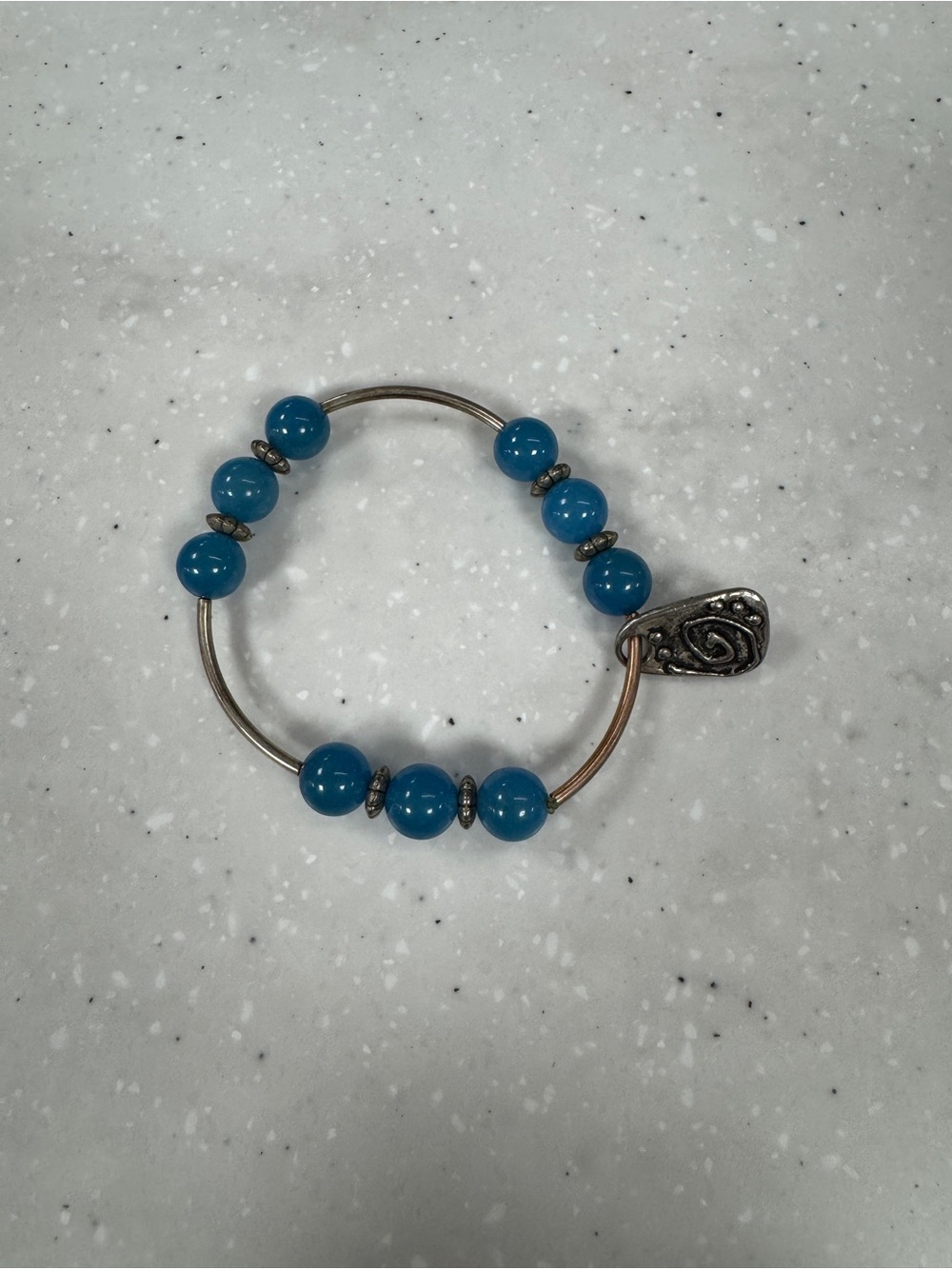 Blue Beaded Stretch Bracelet with Silver Strength Charm